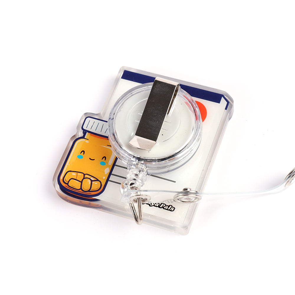 Back of the Rx Rex shaker badge reel showing the standard badge clip attachment.