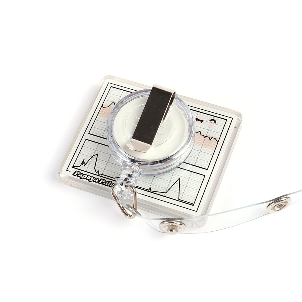 Back of the L&D Charm shaker badge reel showing the standard badge clip attachment.